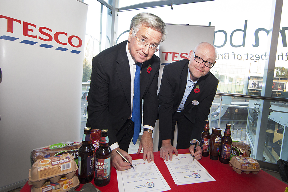 Defence Secretary Michael Fallon and UK Managing Director for Tesco Robin Terrell 