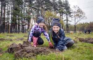 Pictured L-R Rosie and Karis, P5 children from Currie Primary School, Edinburgh, help with the tree planting.