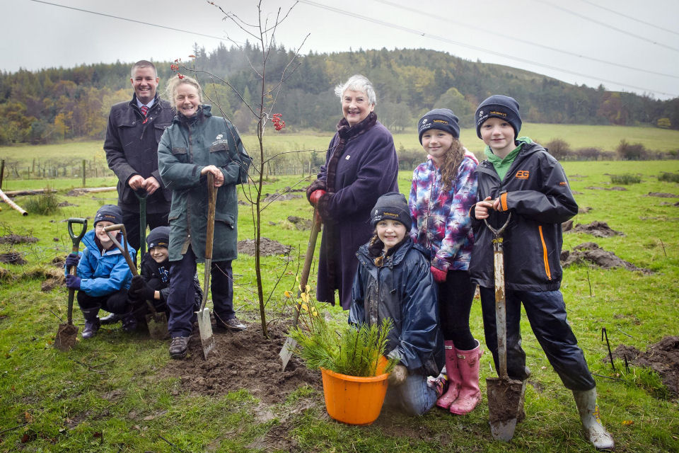 Pictured L-R (adults) Carol Evans, director of the Woodland Trust Scotland, Marc Watson, Sainsbury's Longstone store manager and Margaret Murison from Mid Calder. The P5 children from Currie Primary School are L-R: Olivia, Lewis, Karis, Rosie and Andrew