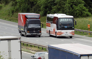 HGV and coach on road