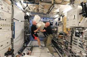 Russian cosmonaut Oleg Artemyev (left) and European Space Agency astronaut Alexander Gerst wearing Armadillo Merino t-shirts on the International Space Station.