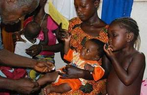 5-month-old Mohamed gets his second dose of pneumococcal conjugate vaccine. Picture: Doune Porter/GAVI Alliance.