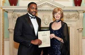 Sam Peter with the Lord Mayor of the City of London, Alderman Fiona Woolf, at the City Banquet at Mansion House