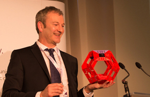 A man from Cybula Ltd – winners of the best pitch of their group at the event – showcasing the Cool Computer