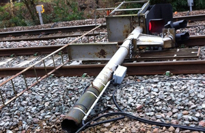 Collapsed signal T2865 lying across the down line closest to the camera (train 1A83 was running on the further of the two lines) (photograph courtesy of Network Rail)