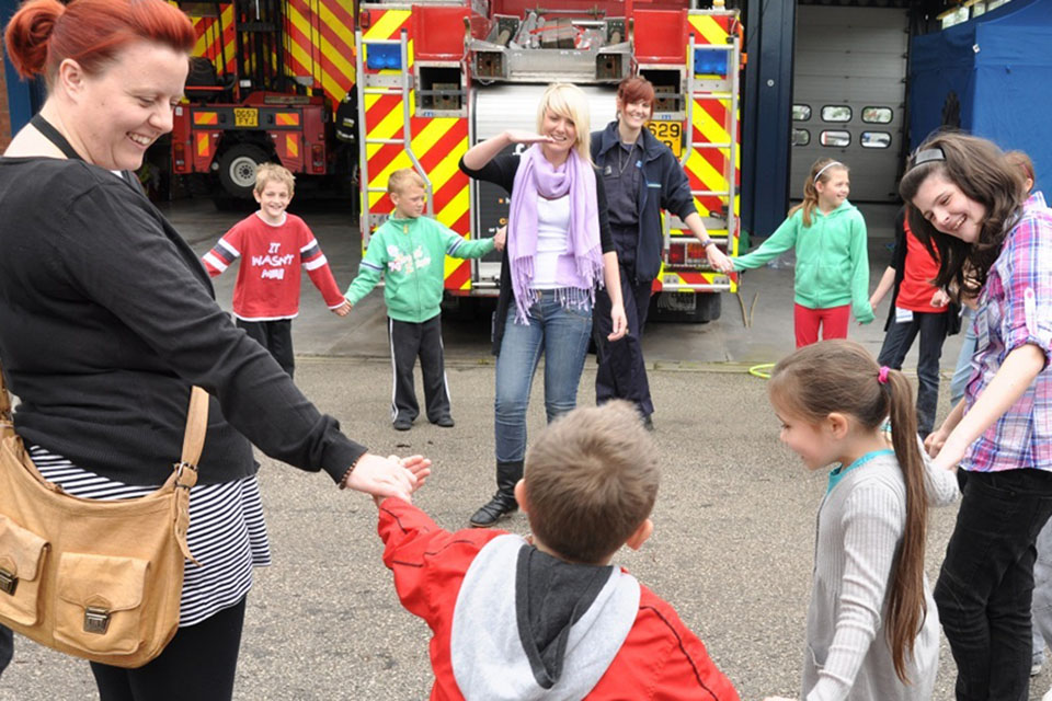 Parents and children at the Cheshire Fire Service safety event