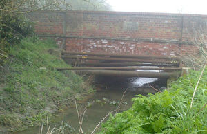 Pipes span the front and under the bridge