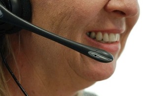 Person using telephone headset