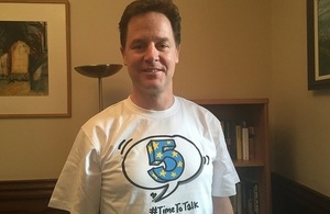 Deputy PM wearing a campaign "Time to Talk" T-shirt