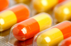 A blister of yellow and orange tablets