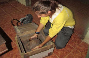 Ms Louise Fletcher handling a pangolin during her time in Vietnam working for the Carnivore and Pangolin Conservation Program.
