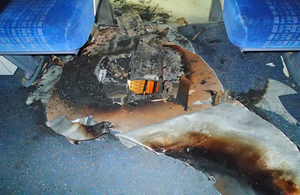 The damaged floor of the train