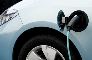 Image of a low carbon vehicle being charged up