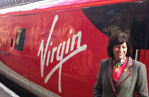 Clare Perry with Virgin train.