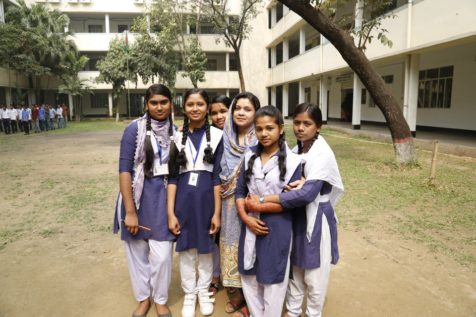 Swapna with classmates and her favourite thing about school: her teacher. Picture: Ricci Coughlan/DFID