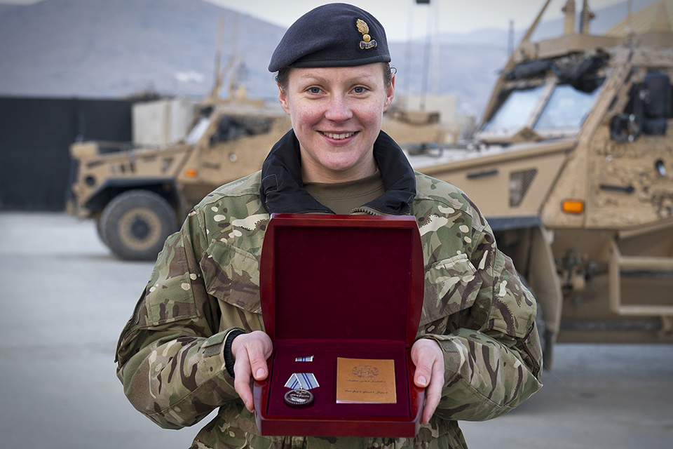 Captain Kendal Moran with her medal for ‘Outstanding Contribution to Afghanistan [Picture: MOD, Crown copyright]
