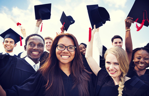 Students throwing mortar boards