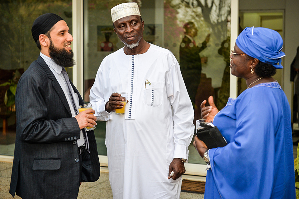 Imam Asim Hafiz talks to Sheikh Abu Bakarr Conteh and Rev Christina Sutton-Koroma