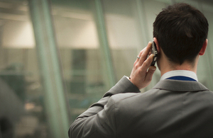 A man talking on a mobile phone.