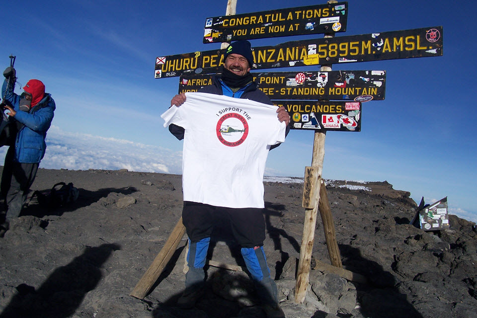 Neill at the top of Kilimanjaro