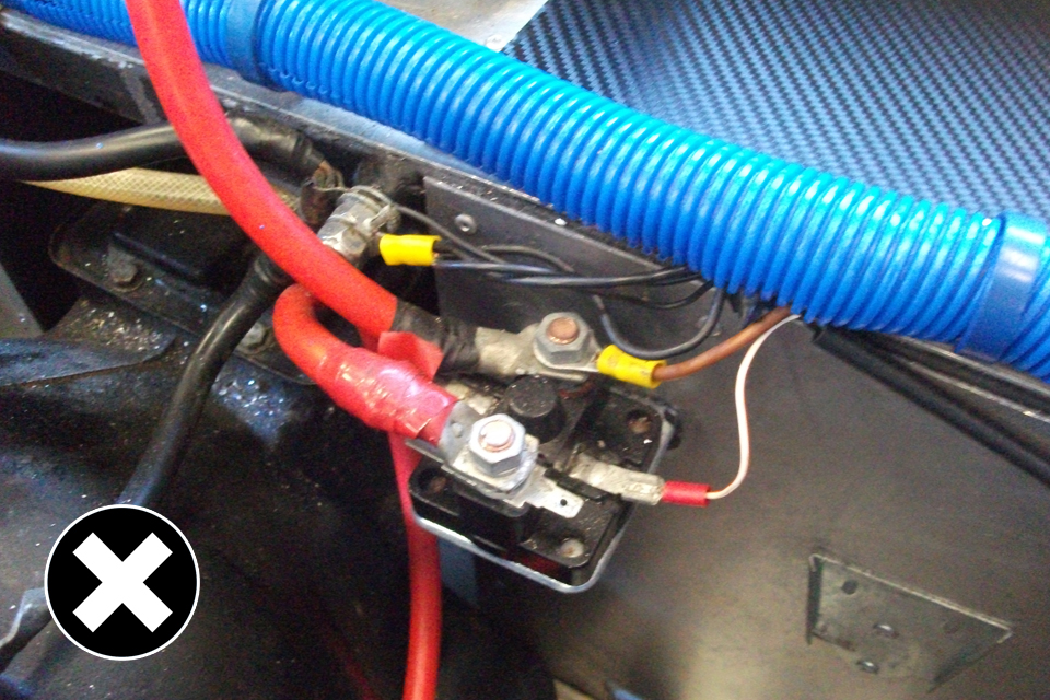 Not allowed: non insulated connections and tape wrapped around wires.