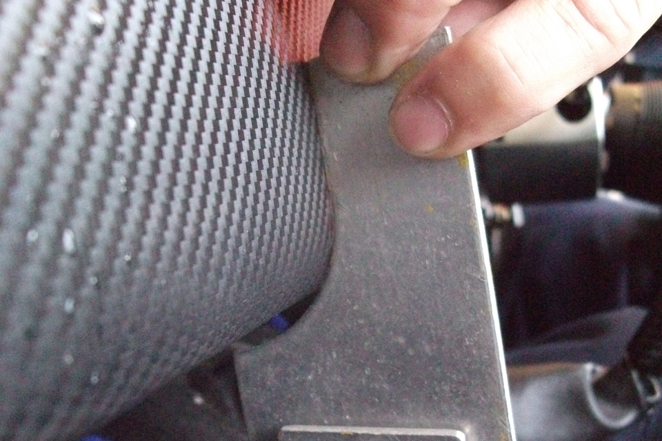 Lower edge of the instrument panel.