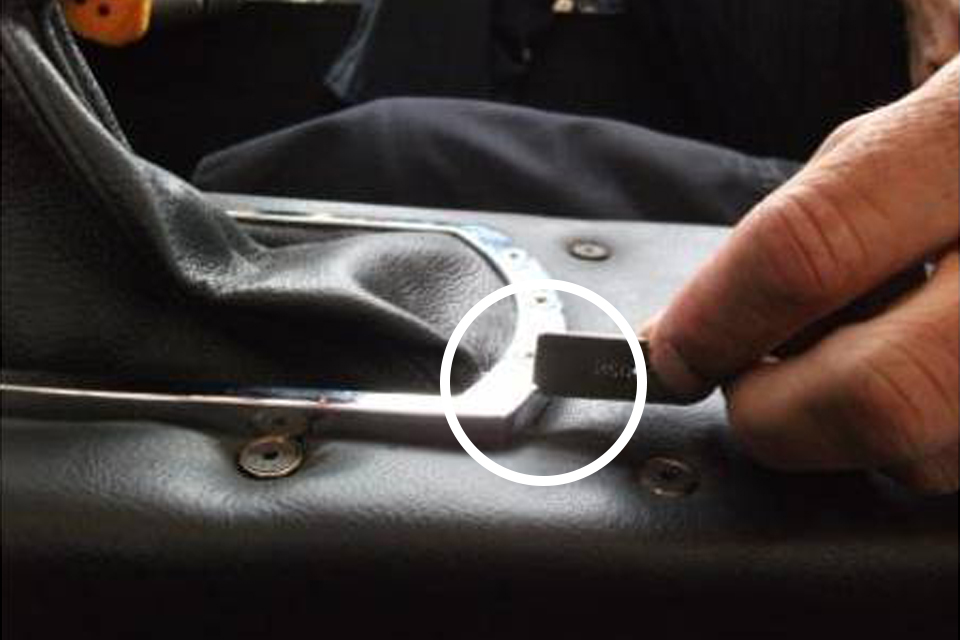 Gear box surround is checked with a radius gauge.