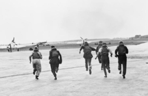 Pilots running to planes