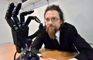 Shadow Robot md Rich Walker with robot hand in foreground