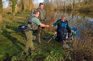 Bailiffs checking rod licences