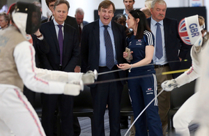 John Whittingdale watches a fencing bout at British Fencing's new centre in Hendon