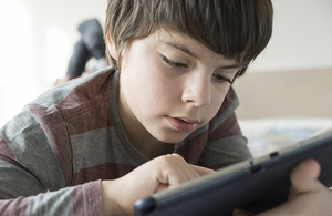 A child using a tablet computer.