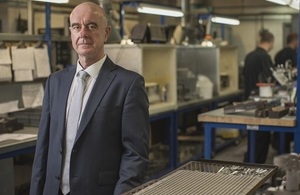 Peter Nicolson, founding director of C4 Carbides, in a busy industrial tooling workshop