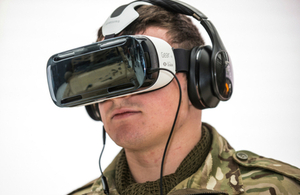 Soldier demonstrating a virtual reality headset.