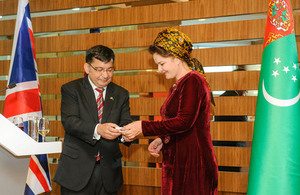 Her Majesty's Ambassador presents medallion