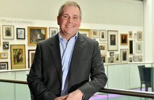 Endomag chief executive Dr Eric Mayes standing on a balcony at the Royal Institution in London