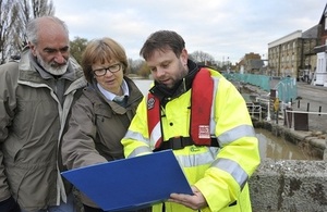 An Environment Agency officer with two flood wardens.