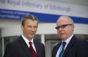 Aridhia chairman David Sibbald (left) with Dr Kris Skwarski, consultant respiratory physician, in front of the Royal Infirmary of Edinburgh.