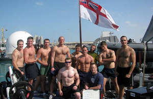 Each of eleven crew members from HMS Pembroke lifted heavy weights over 1,700 times to raise money for charity whilst the ship was alongside in Abu Dhabi