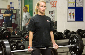 Royal Naval Reservist Able Seaman Helen Barnsley-Parson trains in HMS Collingwood's gym