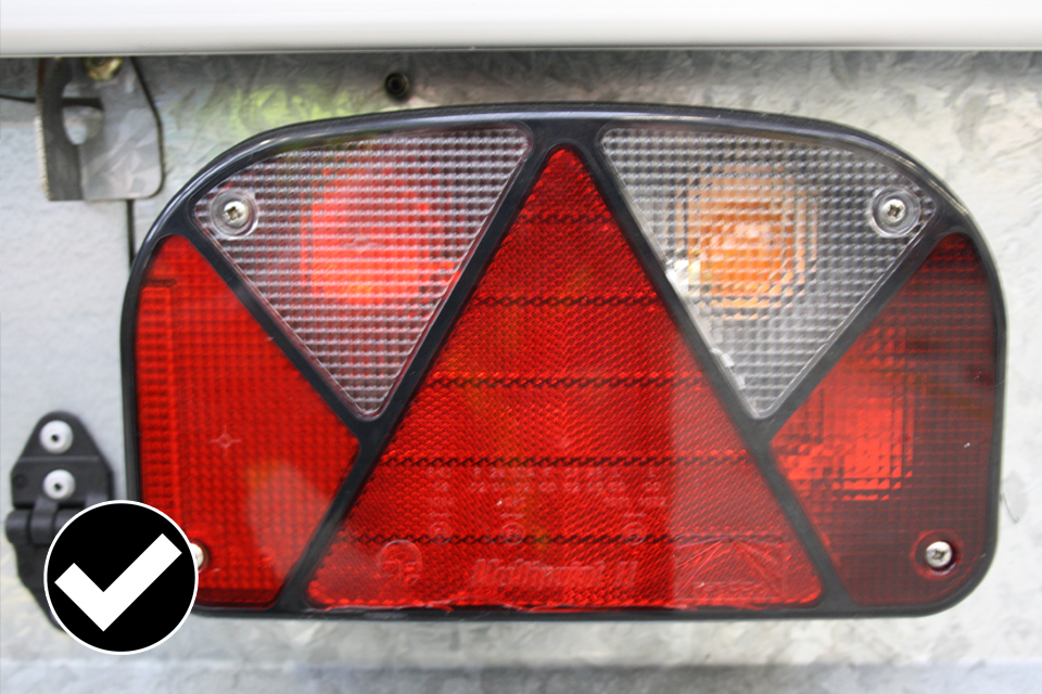 Rear reflector as part of a lamp cluster.