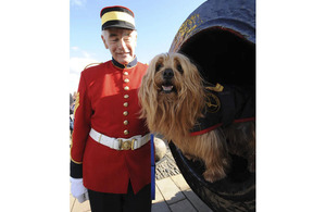 Newly-promoted Blue inside Mons Meg, the famous cannon at Edinburgh Castle, with his handler Brian McKenzie, Chairman of the One O'Clock Gun and Time Ball Association