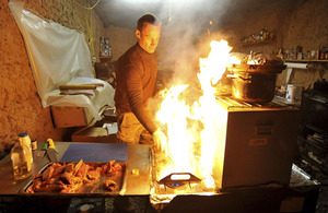 Warrant Officer Class 2 Simon Macey flambés thick cuts of fillet steak