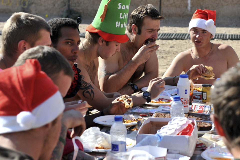 Troops savour the 'Come Dine With Me' experience provided by Warrant Officer Class 2 Simon Macey  