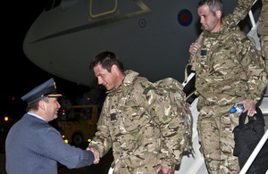 Members of 51 Squadron RAF Regiment are greeted by Station Commander Group Captain Ian Gale at RAF Lossiemouth