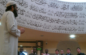 Imam Molana Rashid meets with soldiers from 1st Battalion The Royal Welsh at the Zakaria Mosque in Bolton