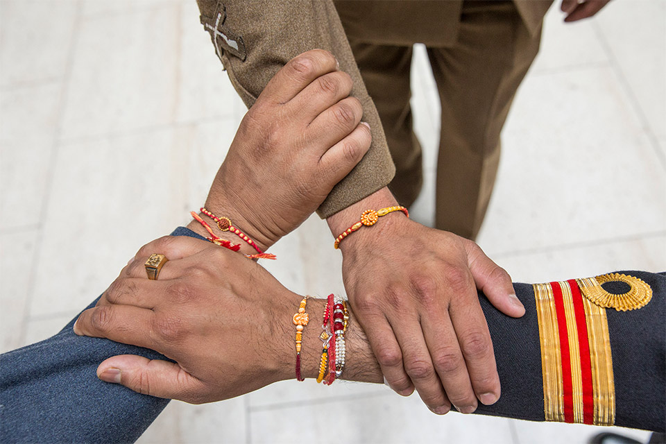 Rakhis on the wrists of serving personnel