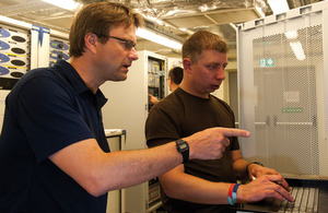 Dr Peter Harvey checks a blip on his monitoring equipment