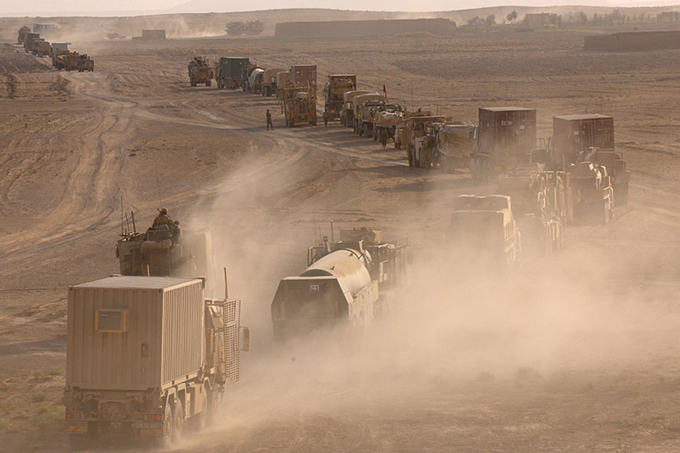 A combat logistic patrol rumbles across the Helmand desert to deliver supplies to outposts on the front line (stock image)