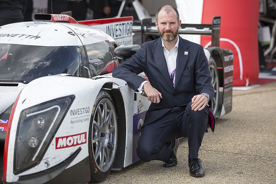 Innovate UK Head of Transport Roland Meister with the Ginetta-Juno car